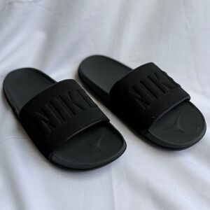 The Nike® Men’s OffCourt slide